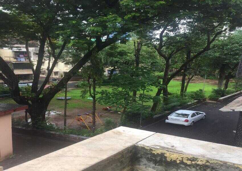 Fully Furnished 4 BHK Residential Apartment with Open View Balconies for Rent at 10th Road, Juhu Scheme.