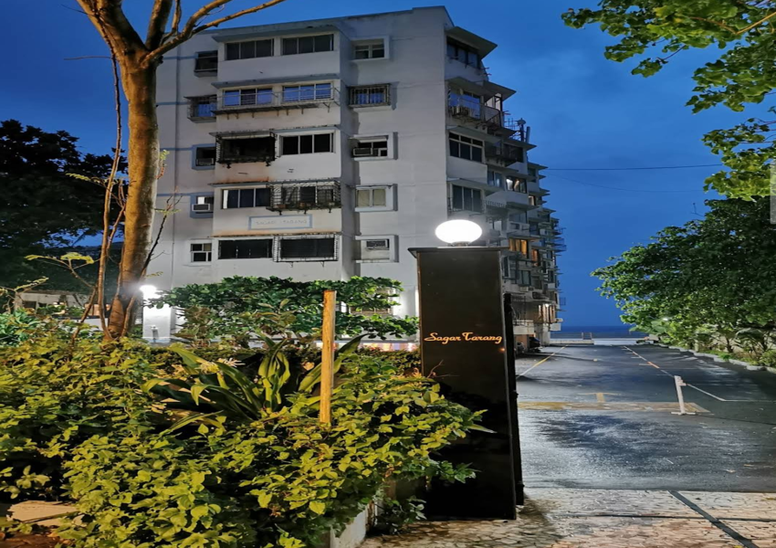 Ideal for Investments: 1 BHK Sea View Apartment under Re-development of 500 sq.ft. Carpet Area for Sale at Sagar Tarang, Versova, Andheri West.